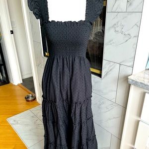 Black flowy, sundress, with elastic bodice and cap sleeves.